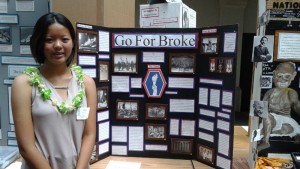 Sixth-grader Victoria (Tori) Yamashita and her panel display on the 442nd RCT, titled ‘Go for Broke’.”